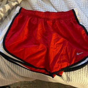 Red, black and white Nike shorts- size M